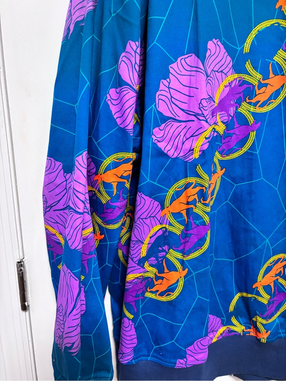Reversible Marvel Blue Bomber Jacket with Purple Floral and Orange Chain Details - Picture 9 of 16